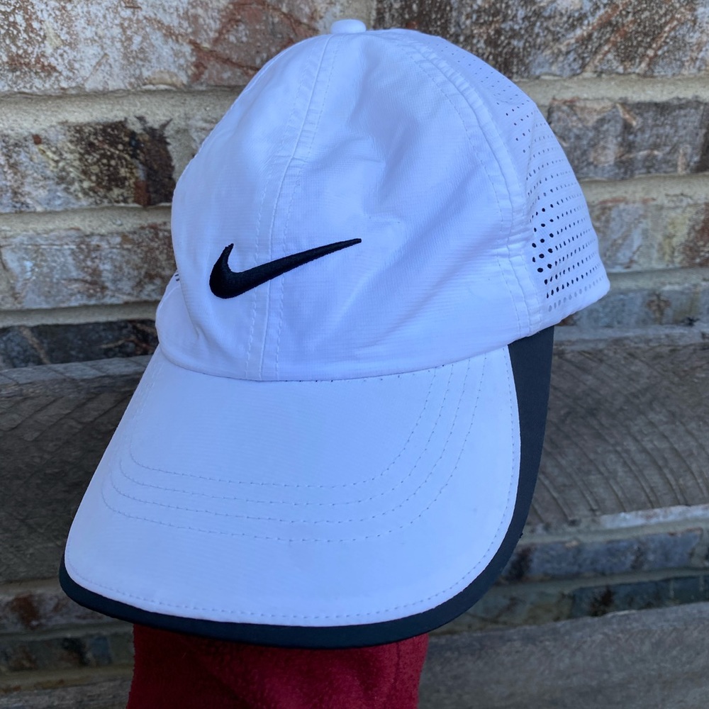 White Nike, golf hat, baseball hat, and adjustable